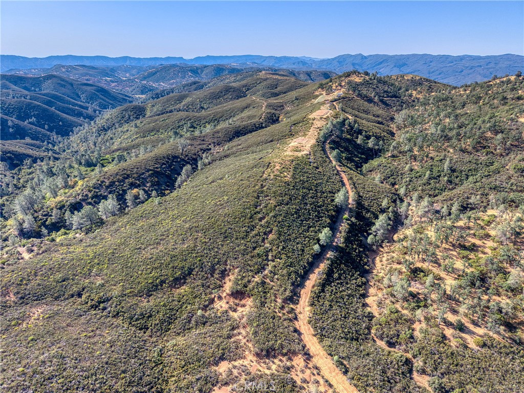 1034 Round Ball Road Clearlake Oaks, CA 95423 - Photo 15 of 46 a view of a mountain in the distance