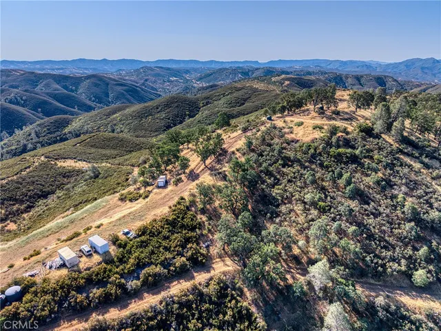 a view of a lake with mountains in the background