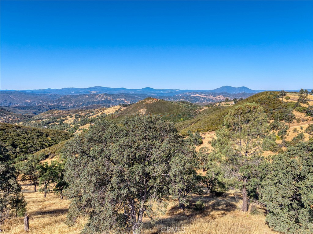 1034 Round Ball Road Clearlake Oaks, CA 95423 - Photo 25 of 46 a view of a city with mountains in the background