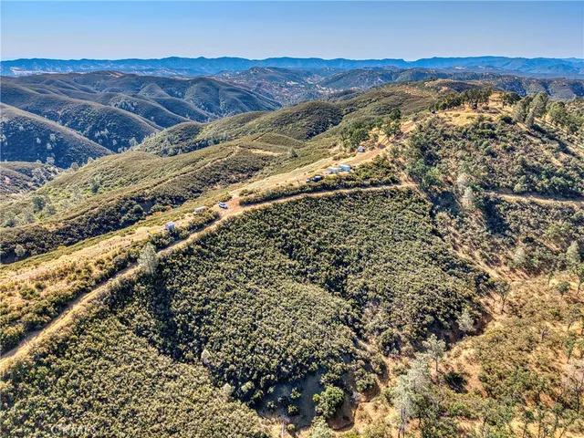 a view of a city with mountains in the background