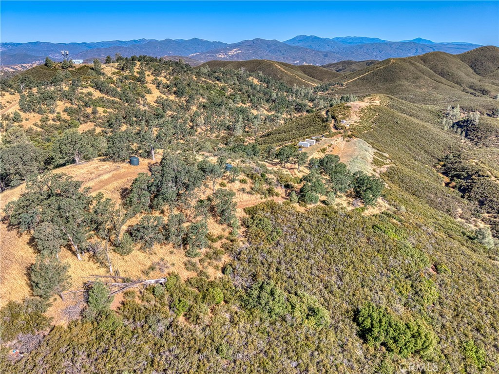 1034 Round Ball Road Clearlake Oaks, CA 95423 - Photo 32 of 46 a view of a city with mountains in the background