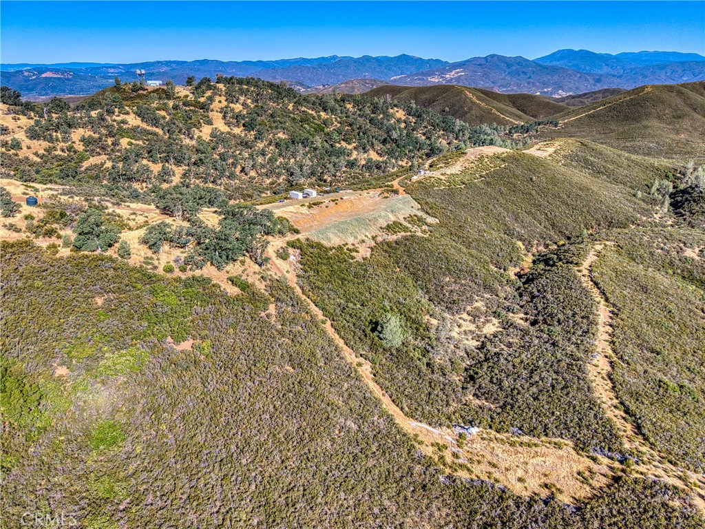 1034 Round Ball Road Clearlake Oaks, CA 95423 - Photo 33 of 46 a view of an outdoor space and a mountain view in back
