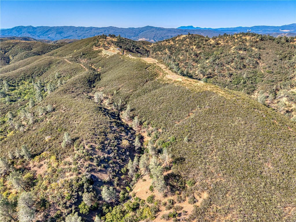 1034 Round Ball Road Clearlake Oaks, CA 95423 - Photo 37 of 46 a view of a sky from a mountain