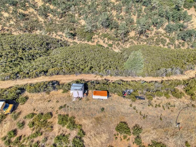 a view of a beach with a mountain in the background