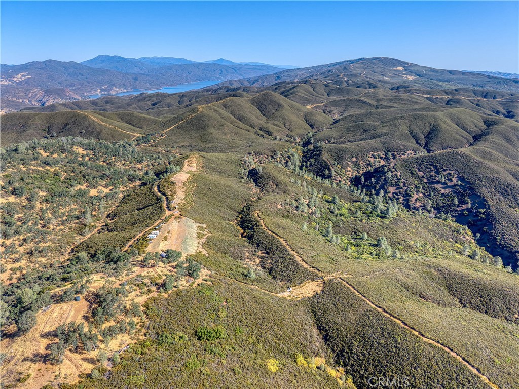 1034 Round Ball Road Clearlake Oaks, CA 95423 - Photo 6 of 46 a view of a mountain with a mountain in the background