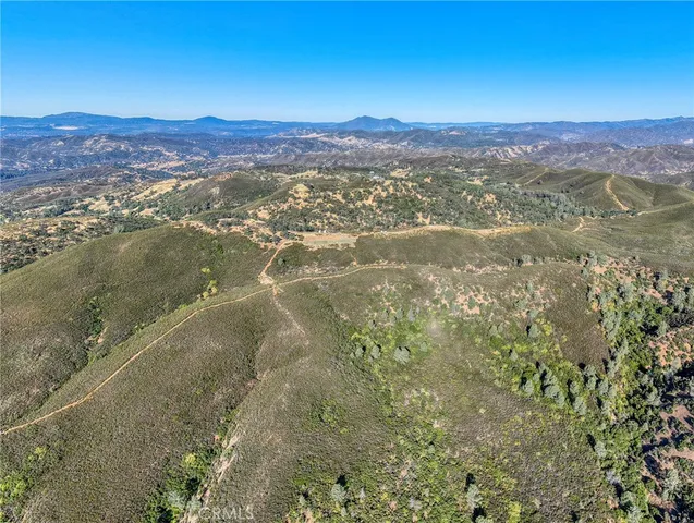 a view of a lake with mountains in the background