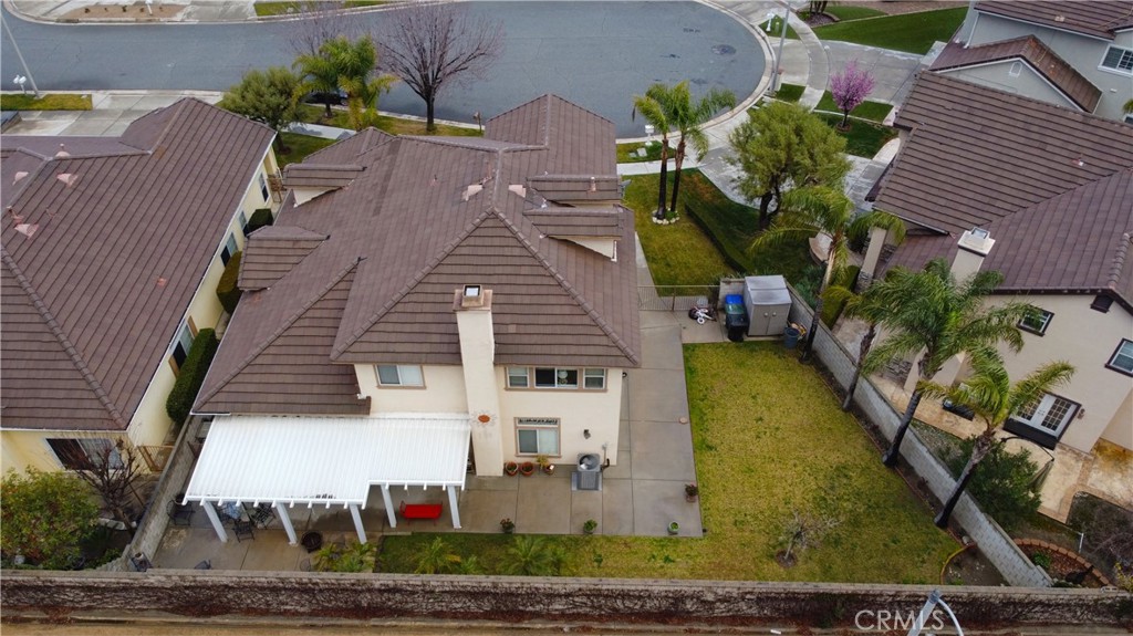 12328 Silver Saddle Drive Rancho Cucamonga, CA 91739 - Photo 3 of 5 a aerial view of a house with garden