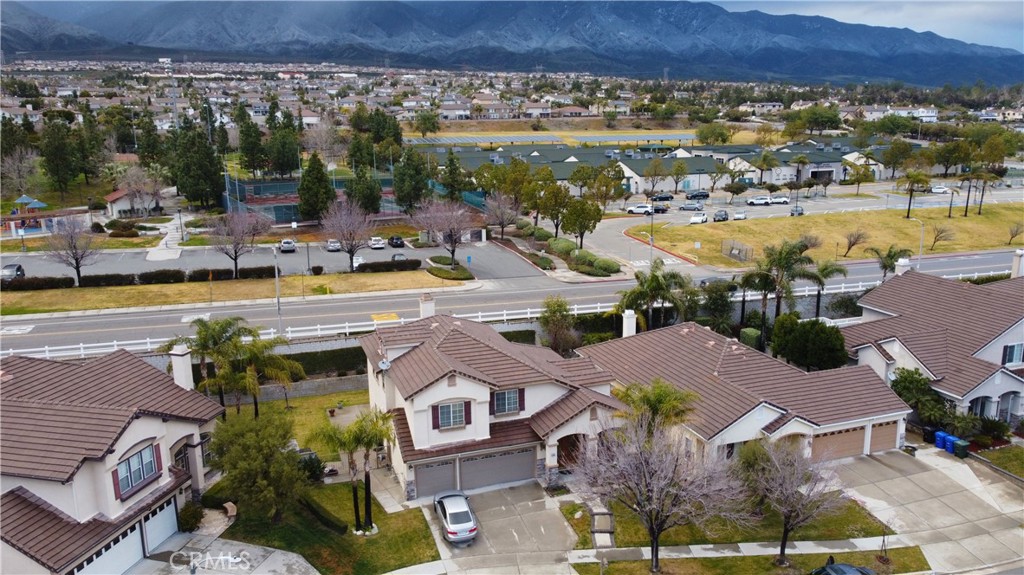 12328 Silver Saddle Drive Rancho Cucamonga, CA 91739 - Photo 4 of 5 an aerial view of residential houses and outdoor space