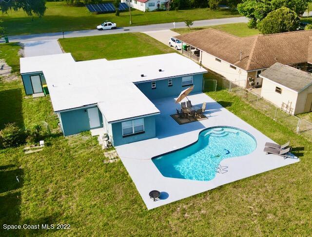 2855 Diamond Road Titusville, FL 32796 - Photo 1 of 61 an aerial view of a house with a garden and swimming pool