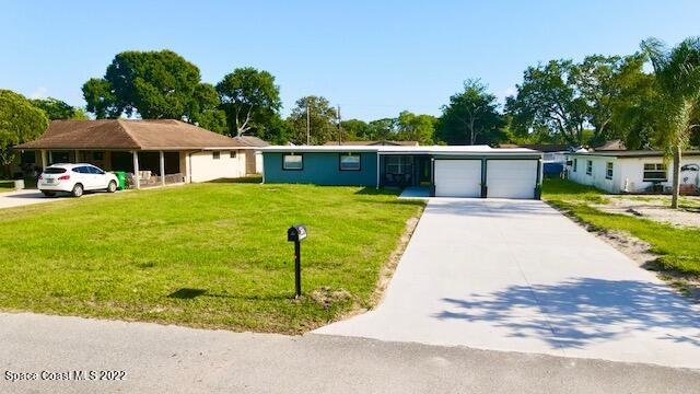 2855 Diamond Road Titusville, FL 32796 - Photo 2 of 61 a view of a house with backyard and sitting area