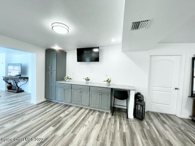 2855 Diamond Road Titusville, FL 32796 - Photo 28 of 61 a spacious bedroom with a bed and a flat screen tv