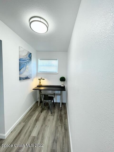 2855 Diamond Road Titusville, FL 32796 - Photo 43 of 61 a view of a room with chairs and wooden floor