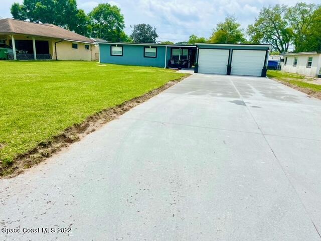 2855 Diamond Road Titusville, FL 32796 - Photo 60 of 61 a view of a house with a yard and sitting area