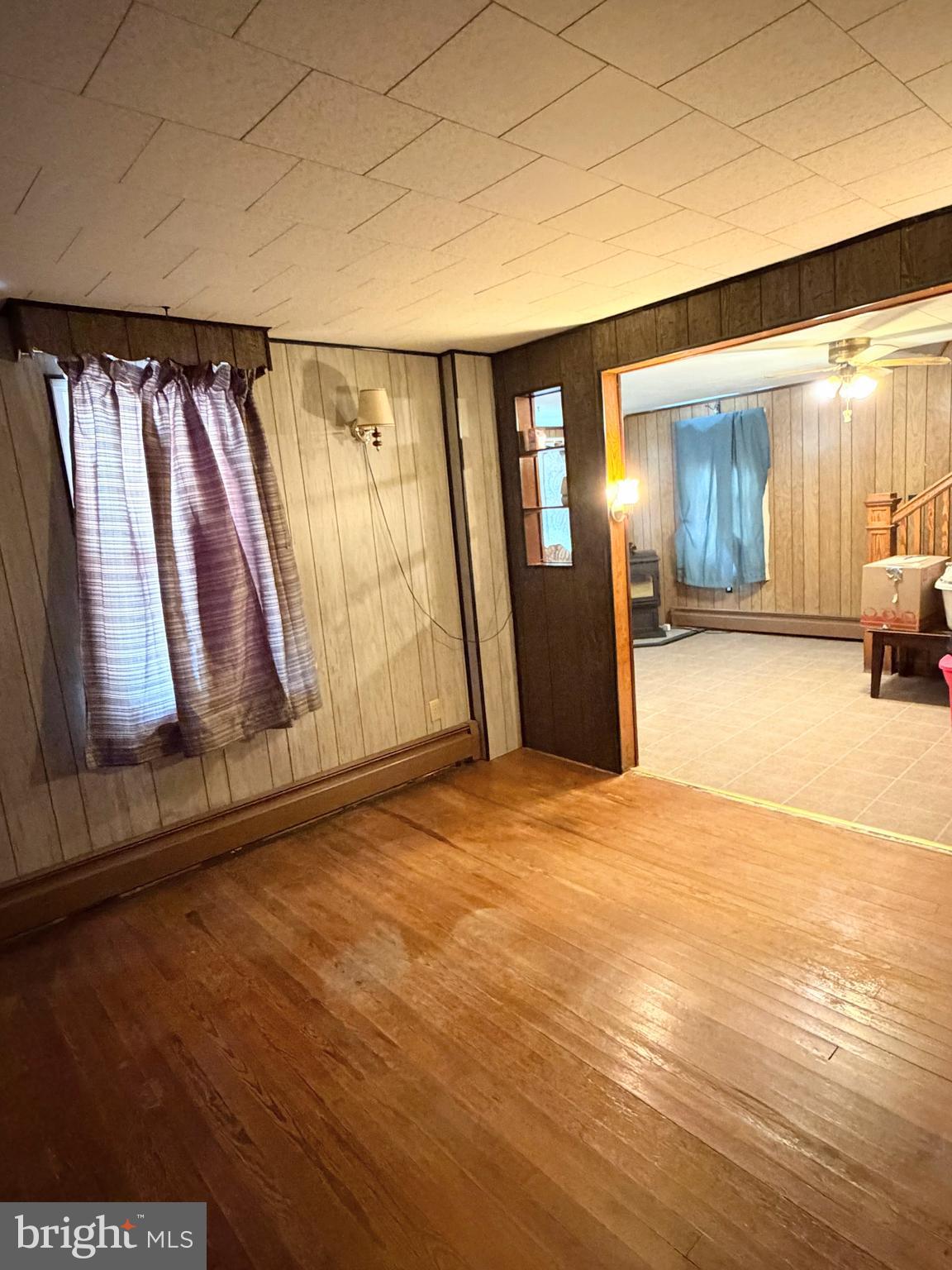 34 West Hanover Street Gettysburg, PA 17325 - Photo 15 of 30 a view of an empty room with wooden floor and a window