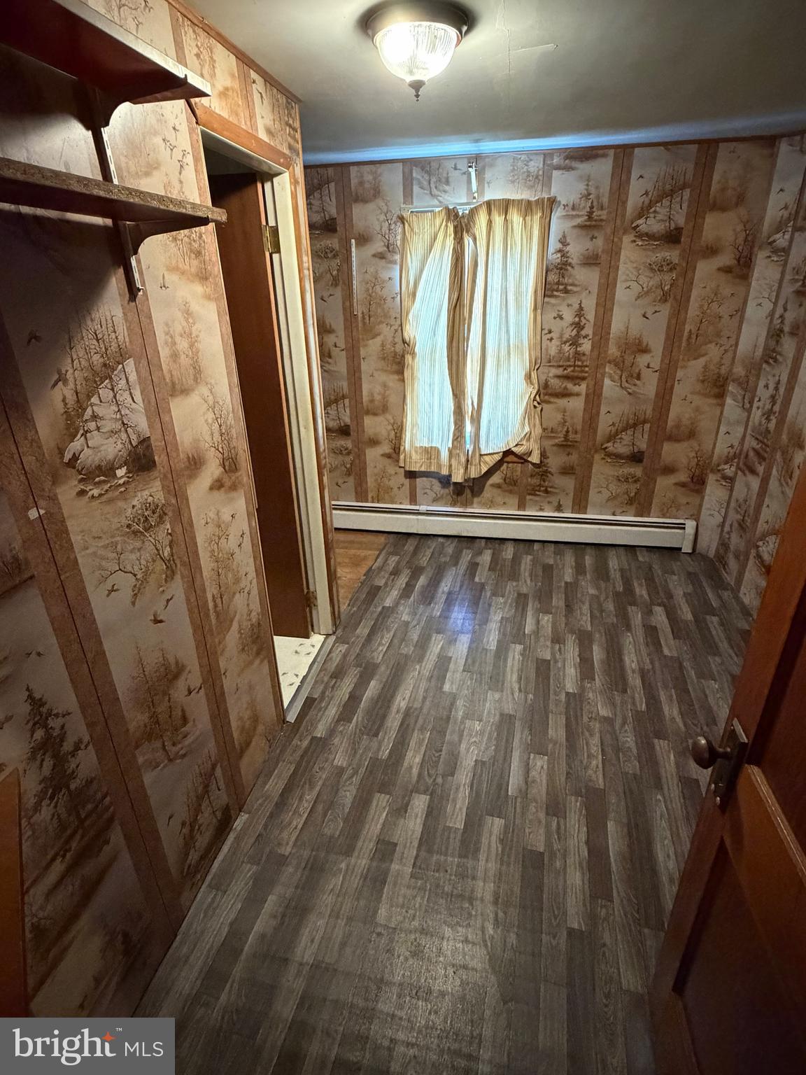 34 West Hanover Street Gettysburg, PA 17325 - Photo 16 of 30 a view of walk in closet with clothes and shoes