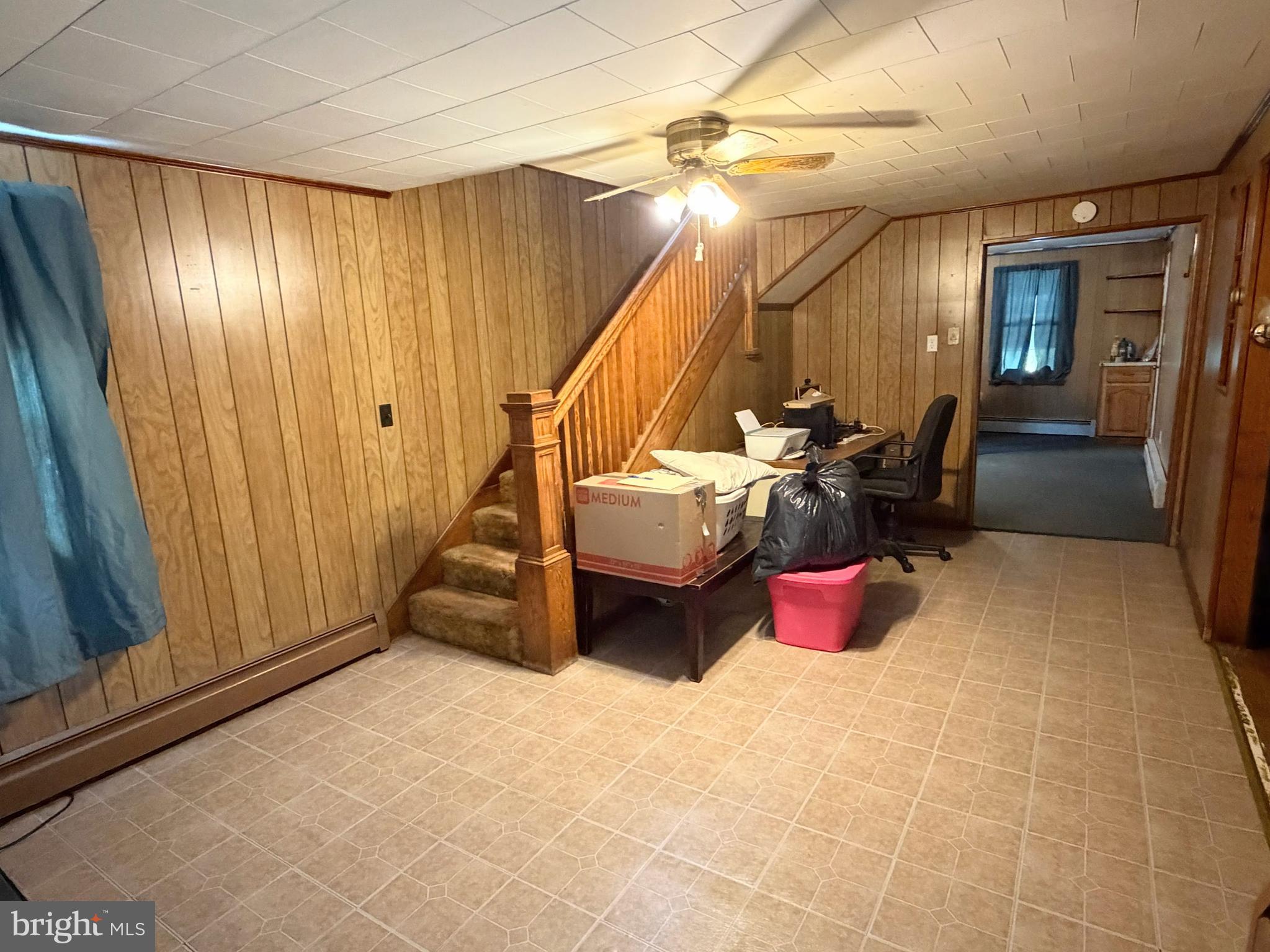 34 West Hanover Street Gettysburg, PA 17325 - Photo 10 of 30 a hallway with a couch and chandelier