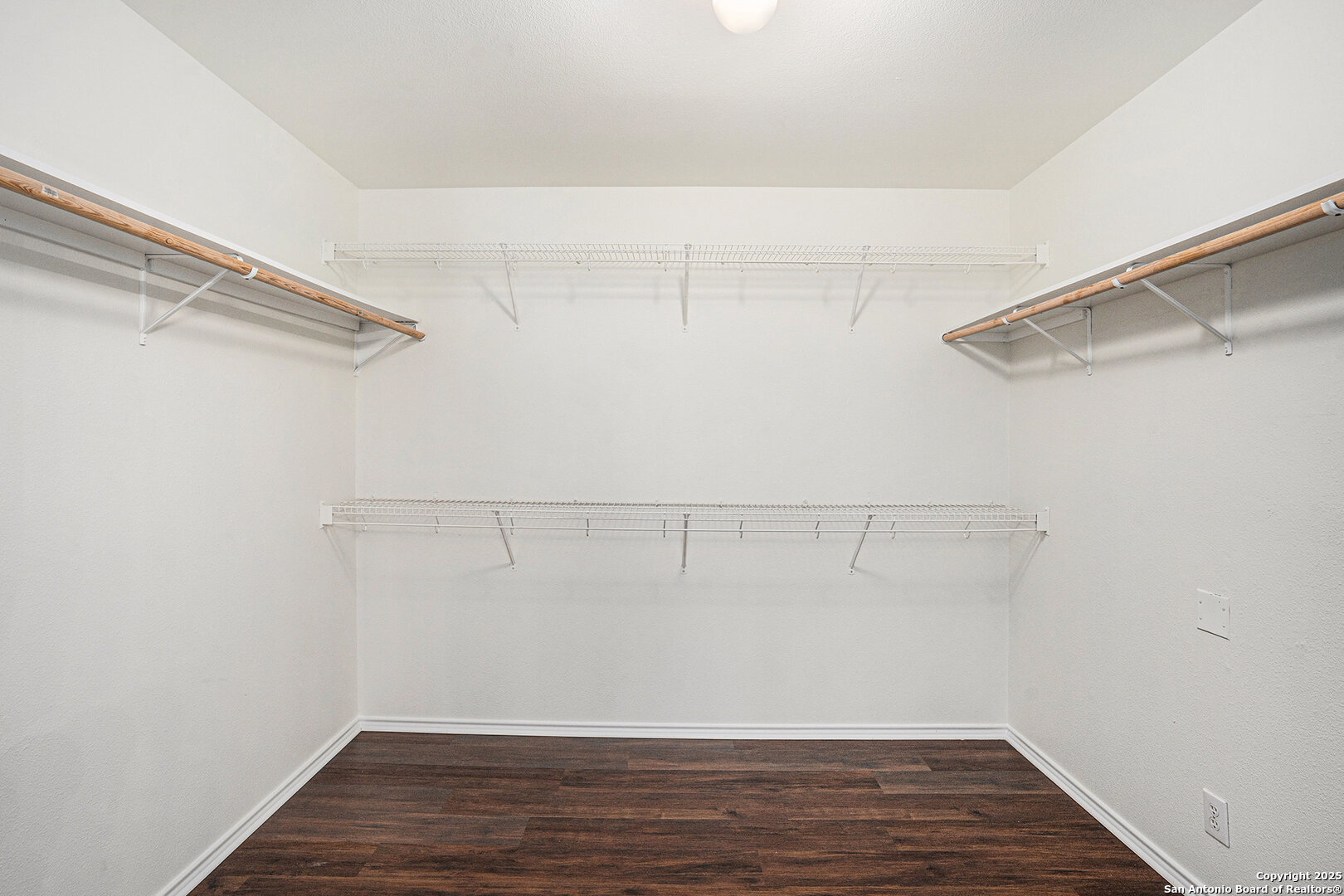 9106 Valhalla Selma, TX 78154 - Photo 16 of 17 a view of a room with racks on the wall