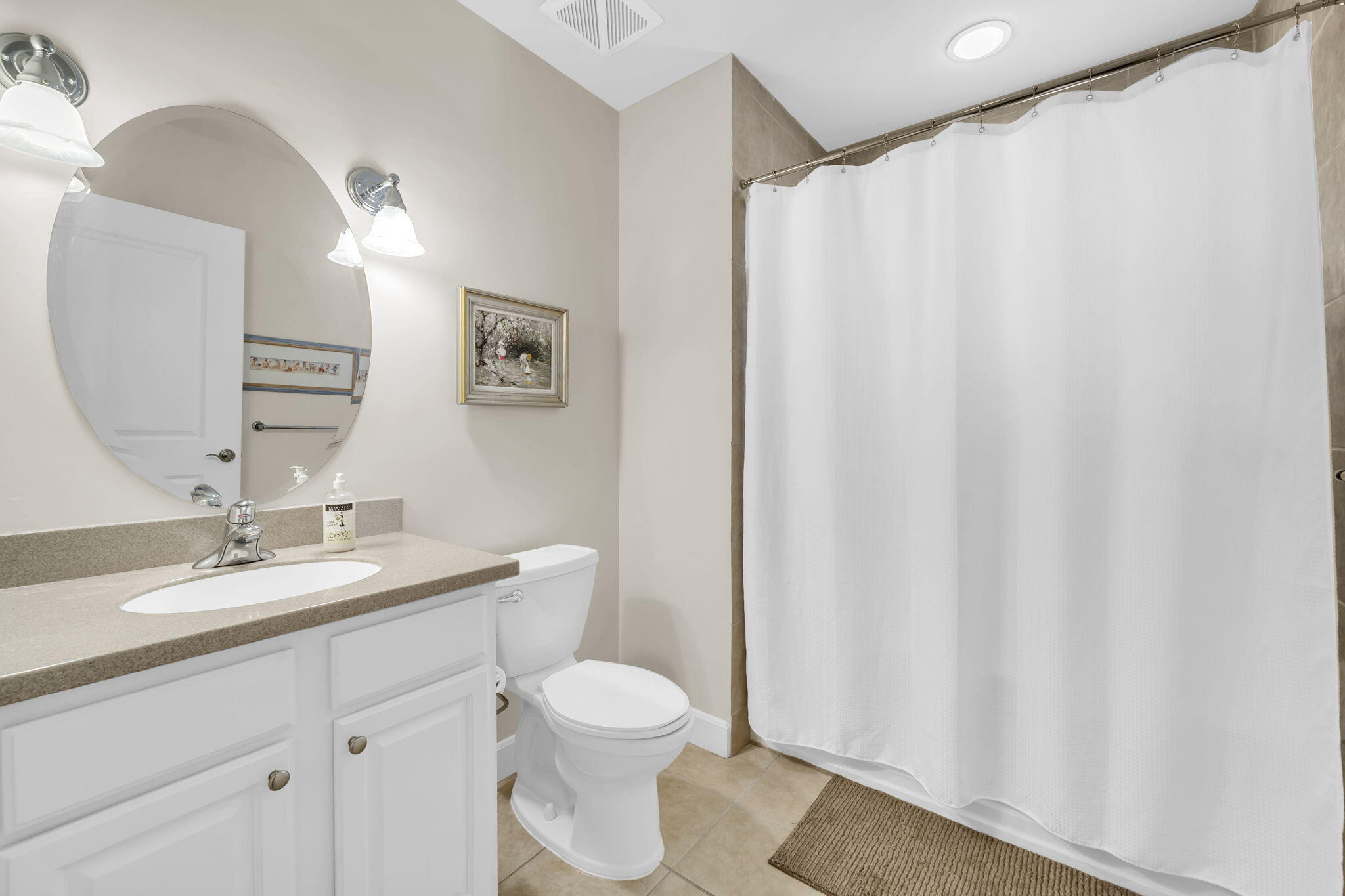5360 Pine Ridge Lane, Unit 5360 Miramar Beach, FL 32550 - Photo 26 of 44 a bathroom with a toilet a sink and a mirror