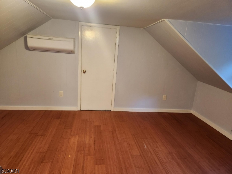 72 Glenwood Mt Road Vernon, NJ 07461 - Photo 7 of 12 a view of an empty room with wooden floor
