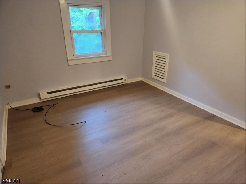 72 Glenwood Mt Road Vernon, NJ 07461 - Photo 9 of 12 a view of a room with racks on the wall