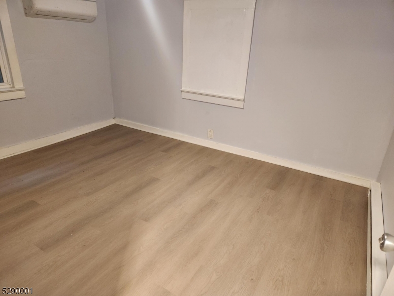 72 Glenwood Mt Road Vernon, NJ 07461 - Photo 10 of 12 a view of a small space with wooden floor and a window