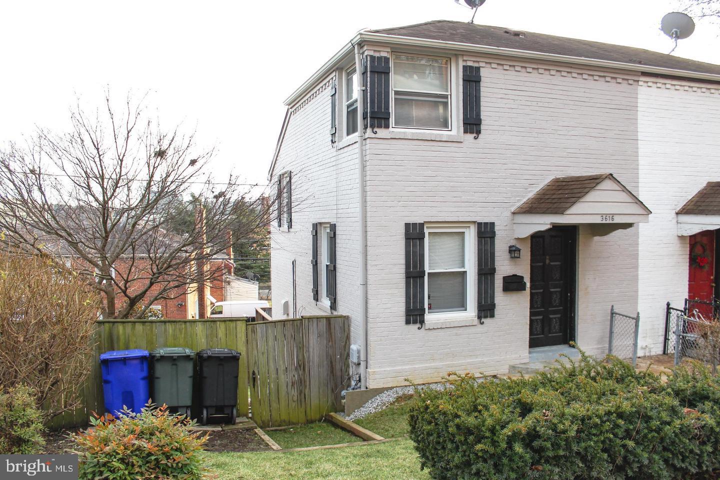3616 South Kemper Road Arlington, VA 22206 - Photo 1 of 24 a front view of a house with garden