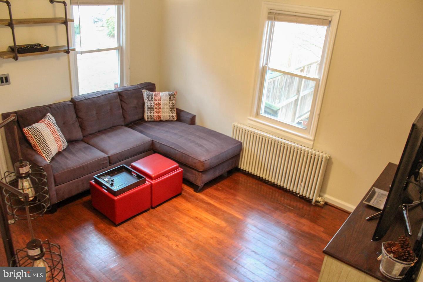 3616 South Kemper Road Arlington, VA 22206 - Photo 6 of 24 a bedroom with furniture and a window