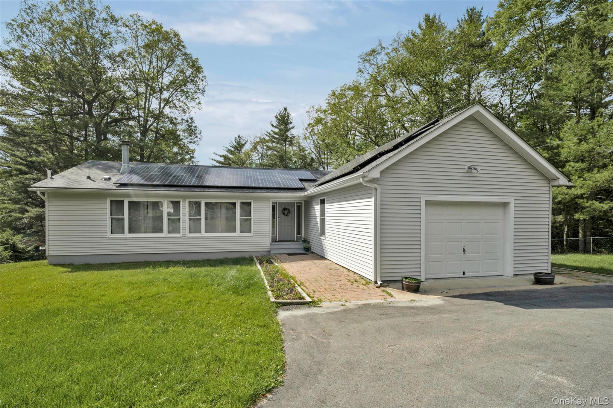39 Pitio Road Glen Spey, NY 12737 - Photo 1 of 50 a view of a house with a yard and large tree