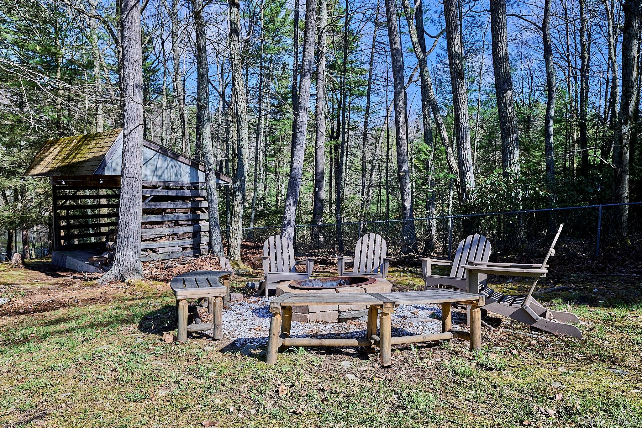 39 Pitio Road Glen Spey, NY 12737 - Photo 12 of 50 a view of backyard with sitting area and garden