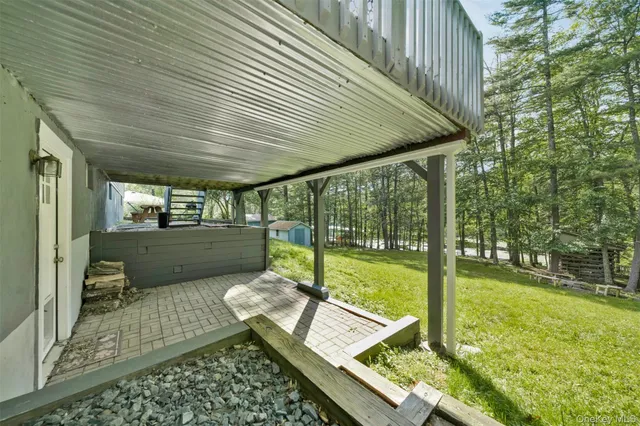 a sitting area with furniture and outdoor view