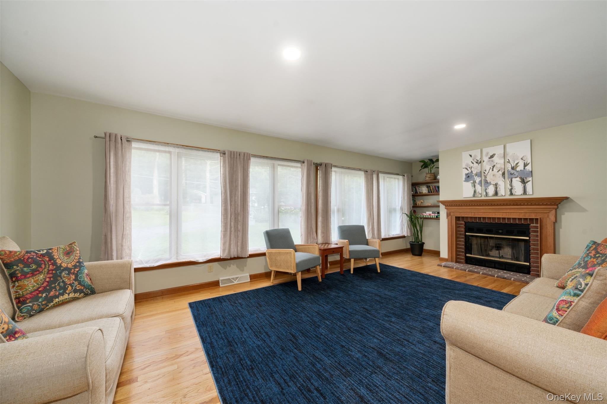 39 Pitio Road Glen Spey, NY 12737 - Photo 29 of 50 a living room with furniture and a fireplace