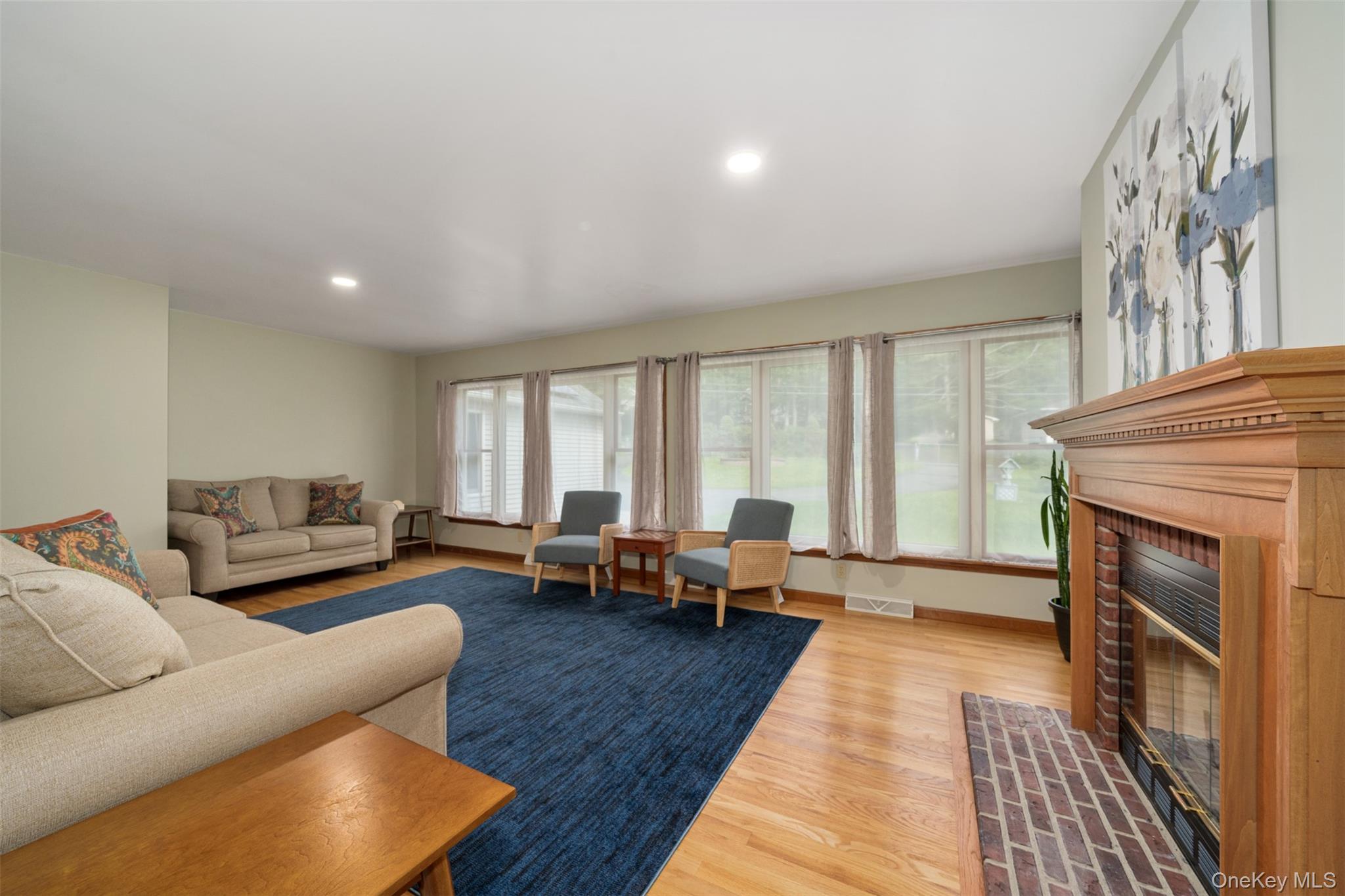 39 Pitio Road Glen Spey, NY 12737 - Photo 31 of 50 a living room with furniture and a fireplace