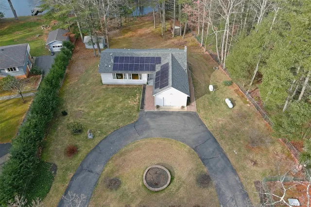 a house view with a garden space