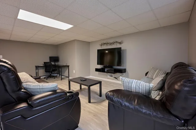 a room with dining table and wooden floor
