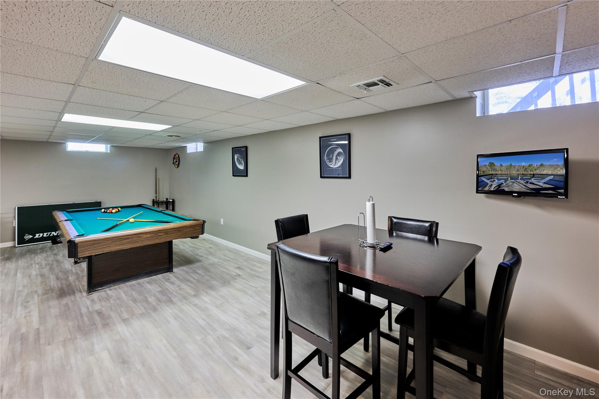 39 Pitio Road Glen Spey, NY 12737 - Photo 43 of 50 a room with dining table and wooden floor