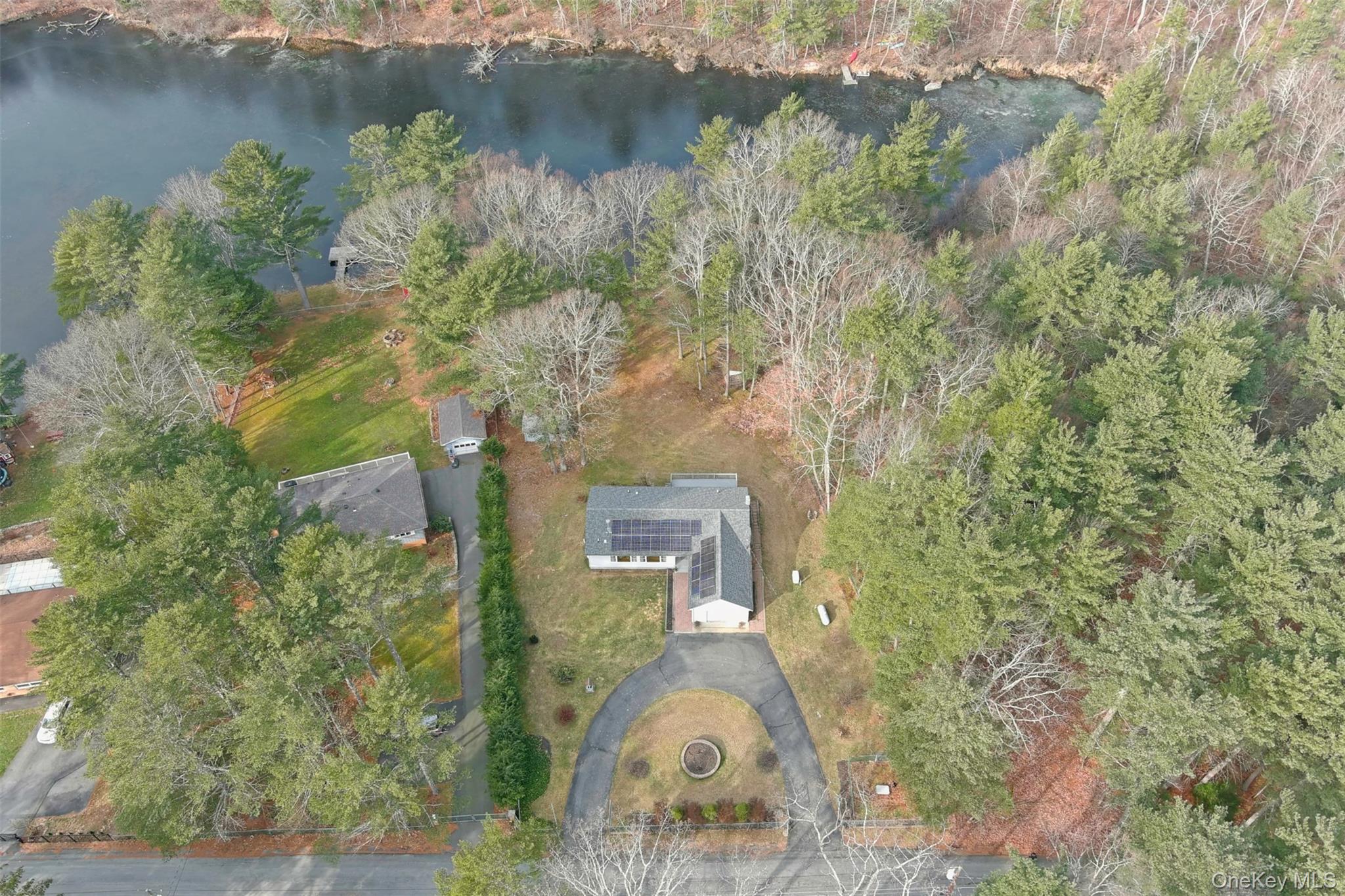 39 Pitio Road Glen Spey, NY 12737 - Photo 48 of 50 a aerial view of a house with a yard and large trees