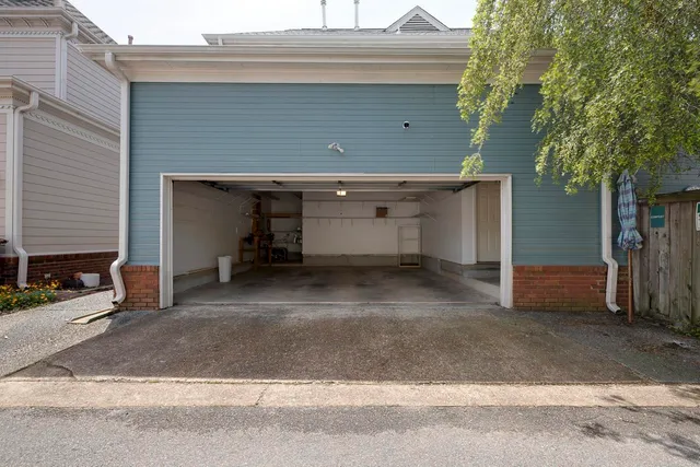 a view of a house with a garage