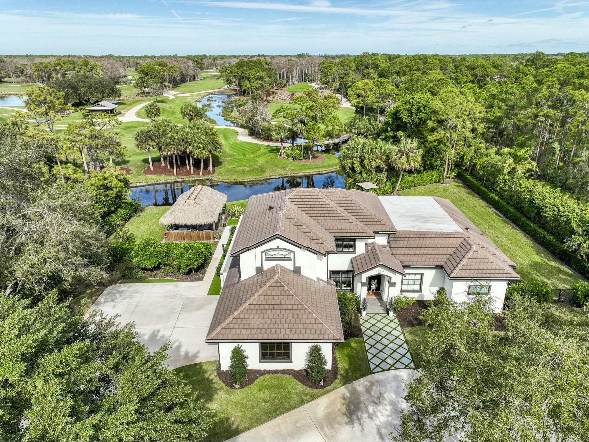 1216 Southeast Colony Way Jupiter, FL 33478 - Photo 2 of 94 Golf Course & Nature Views