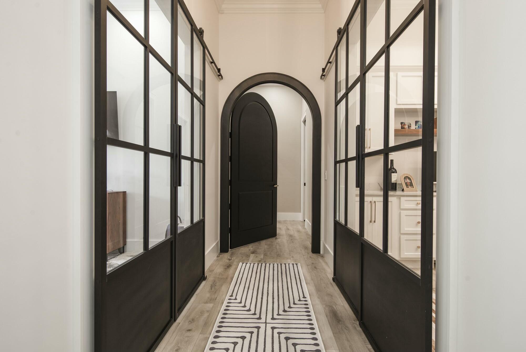 1216 Southeast Colony Way Jupiter, FL 33478 - Photo 33 of 94 Hallway to Primary Suite