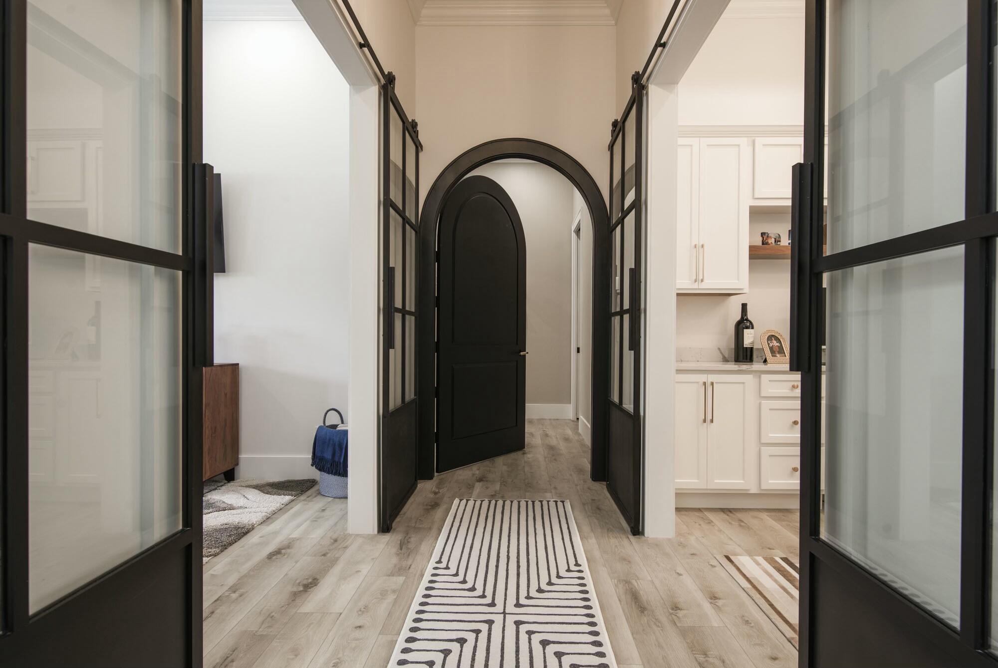 1216 Southeast Colony Way Jupiter, FL 33478 - Photo 34 of 94 Hallway to Primary Suite