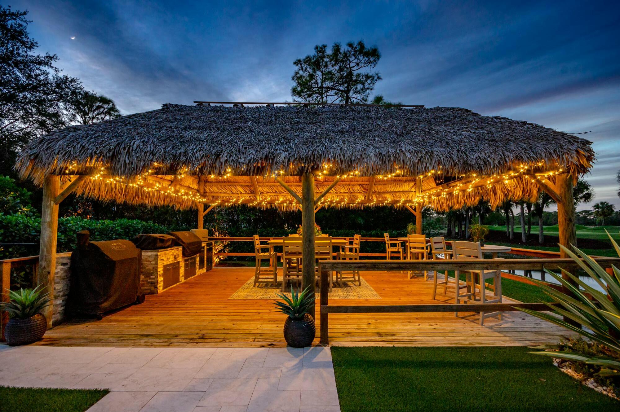 1216 Southeast Colony Way Jupiter, FL 33478 - Photo 5 of 94 Expansive Tiki Hut | Summer Kitchen