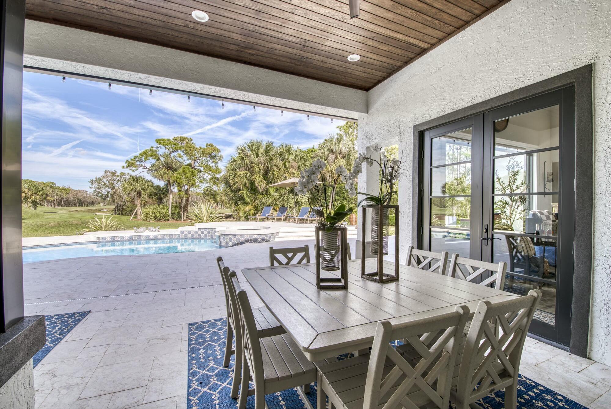 1216 Southeast Colony Way Jupiter, FL 33478 - Photo 64 of 94 Covered Patio