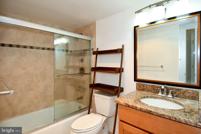 a view of staircase with white walls