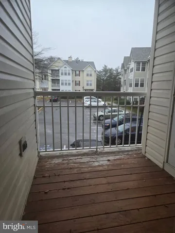 a view of a house with a tree