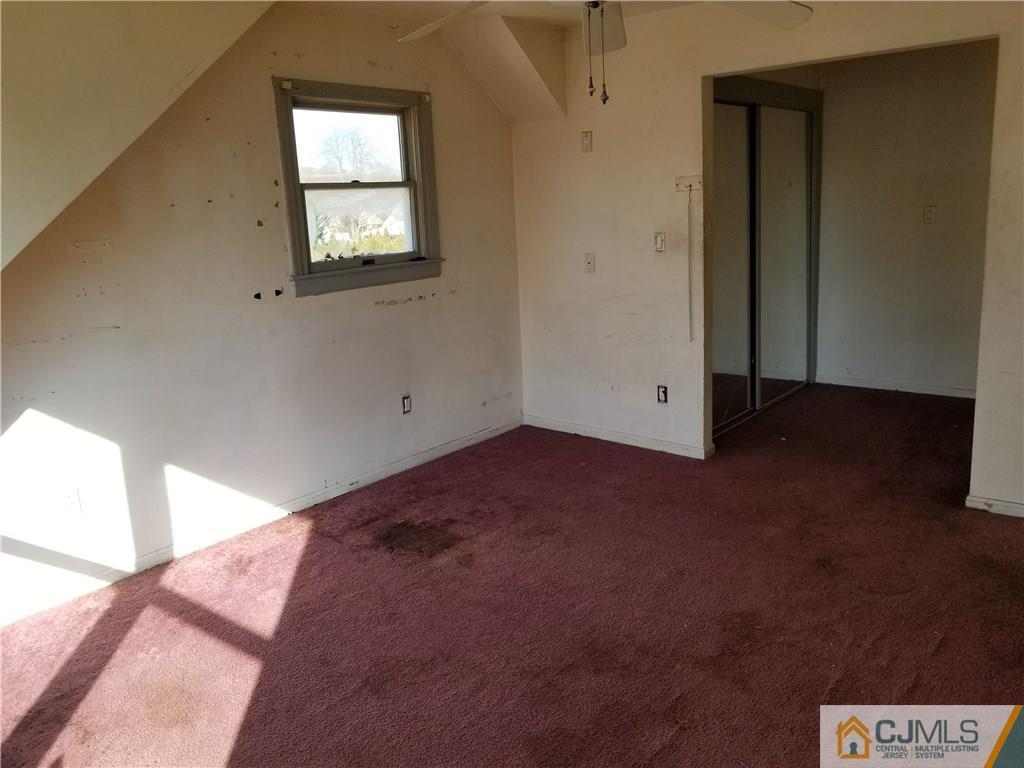 6 Rodney Road East Brunswick, NJ 08816 - Photo 14 of 15 a view of empty room with window