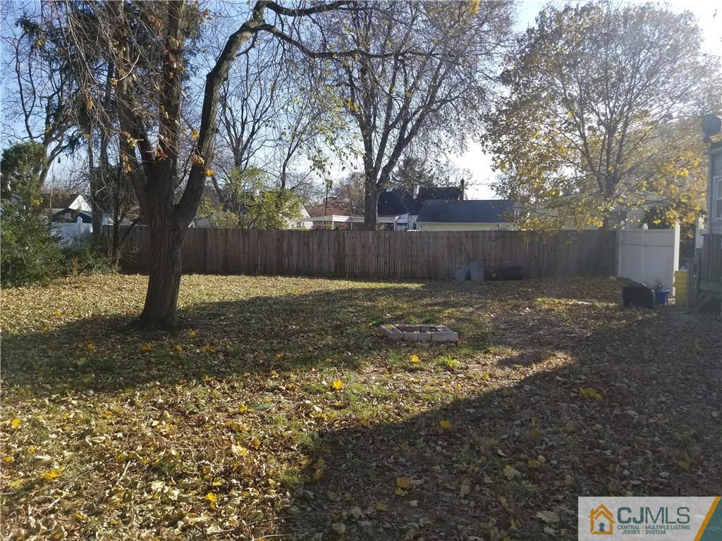 6 Rodney Road East Brunswick, NJ 08816 - Photo 3 of 15 a view of a backyard