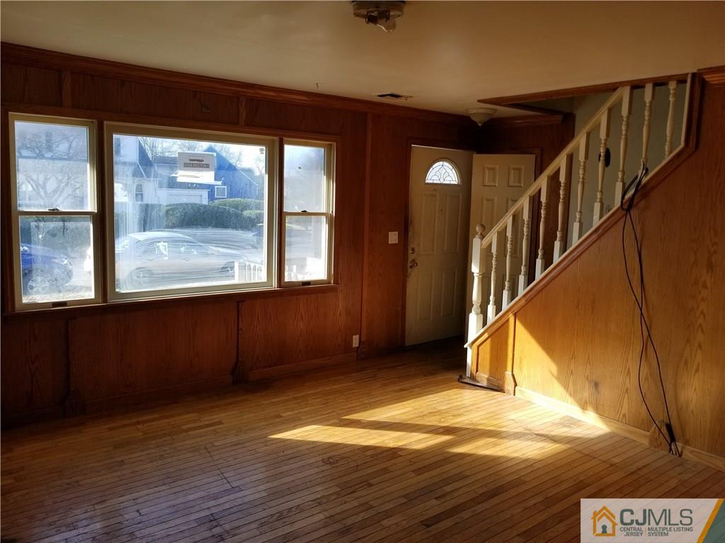 6 Rodney Road East Brunswick, NJ 08816 - Photo 5 of 15 a view of an entryway with wooden floor