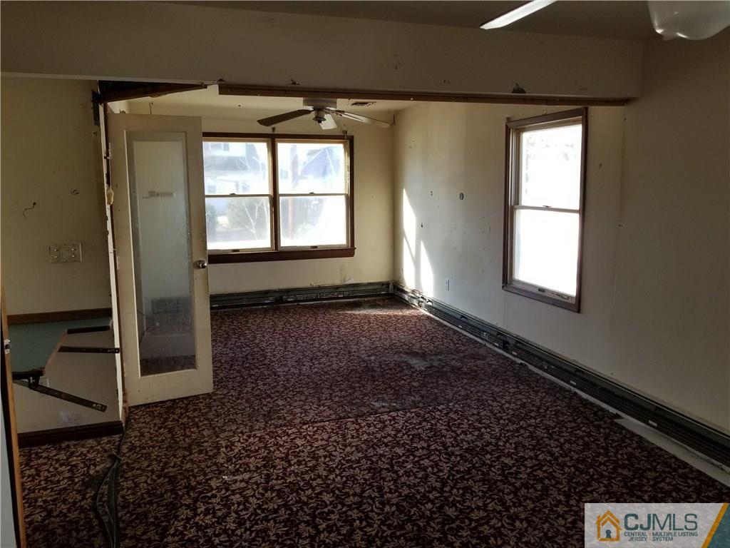 6 Rodney Road East Brunswick, NJ 08816 - Photo 8 of 15 a view of a room with a window
