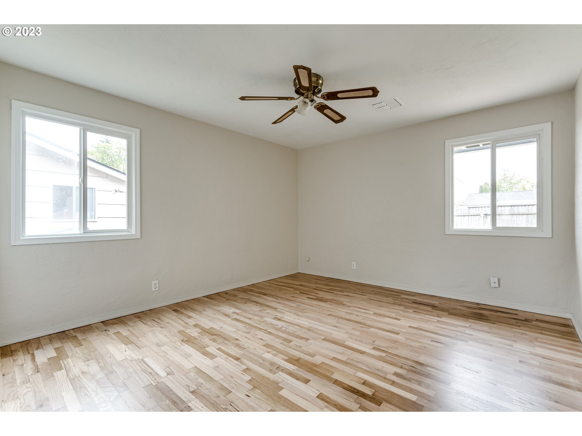 833 Elm Drive Eugene, OR 97404 - Photo 11 of 20 a view of an empty room with a window