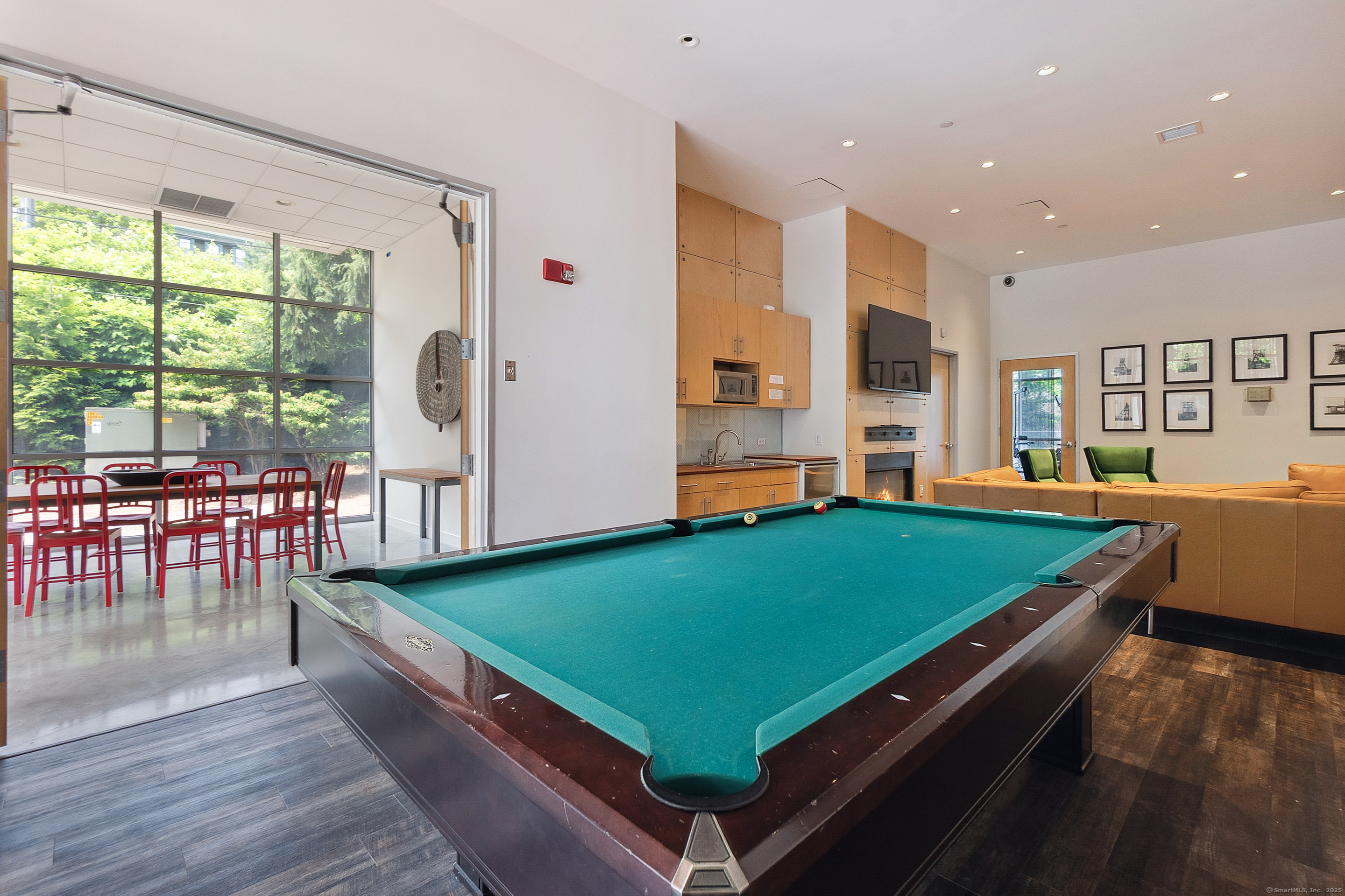 33 North Water Street, Unit 505 Norwalk, CT 06854 - Photo 19 of 25 a room with pool table and windows